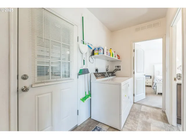 a storage room with washer and dryer