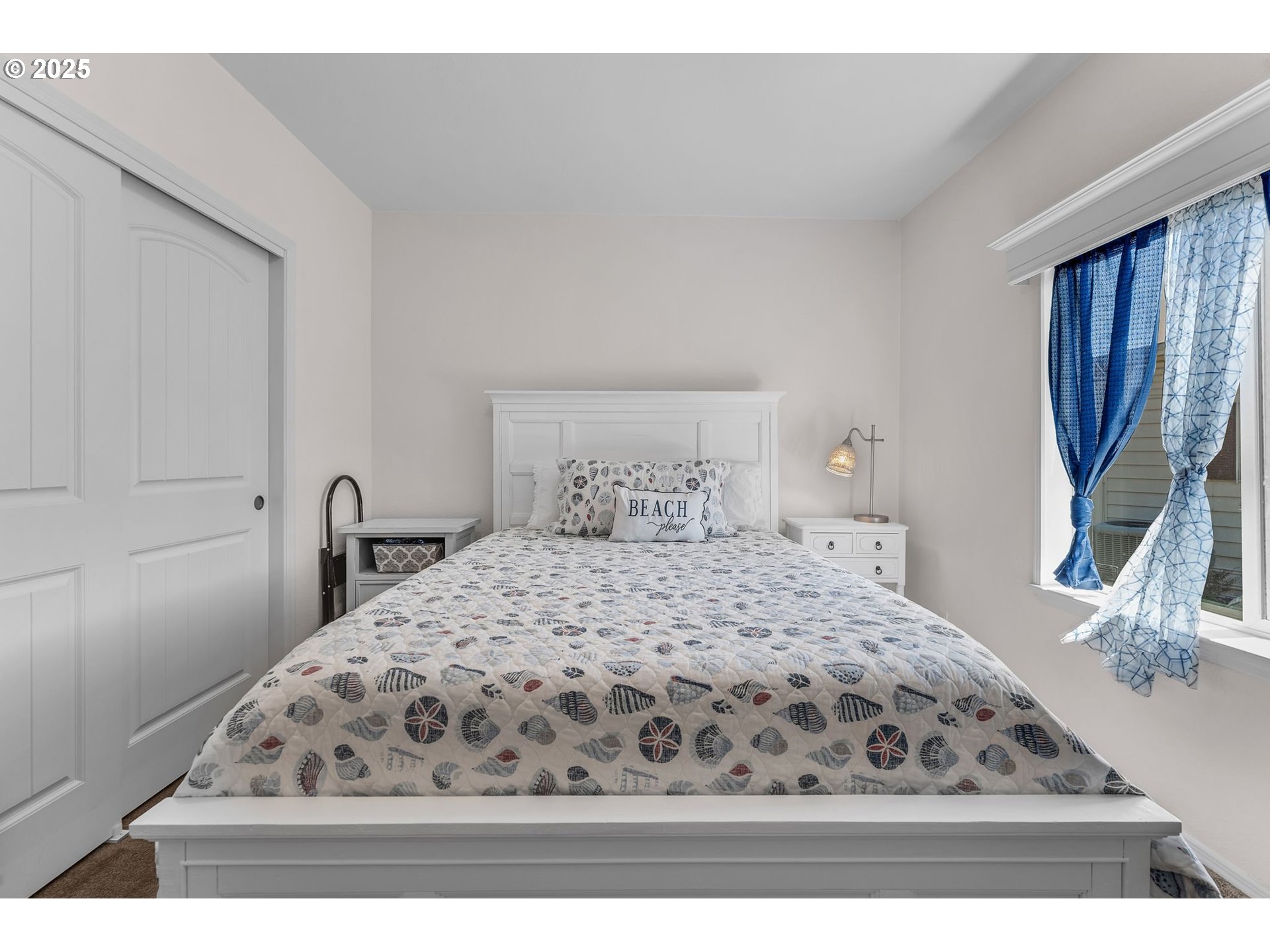 1999 Jansen Way, Unit 29 Woodburn, OR 97071 - Photo 27 of 33 a bedroom with a bed window and a night stand