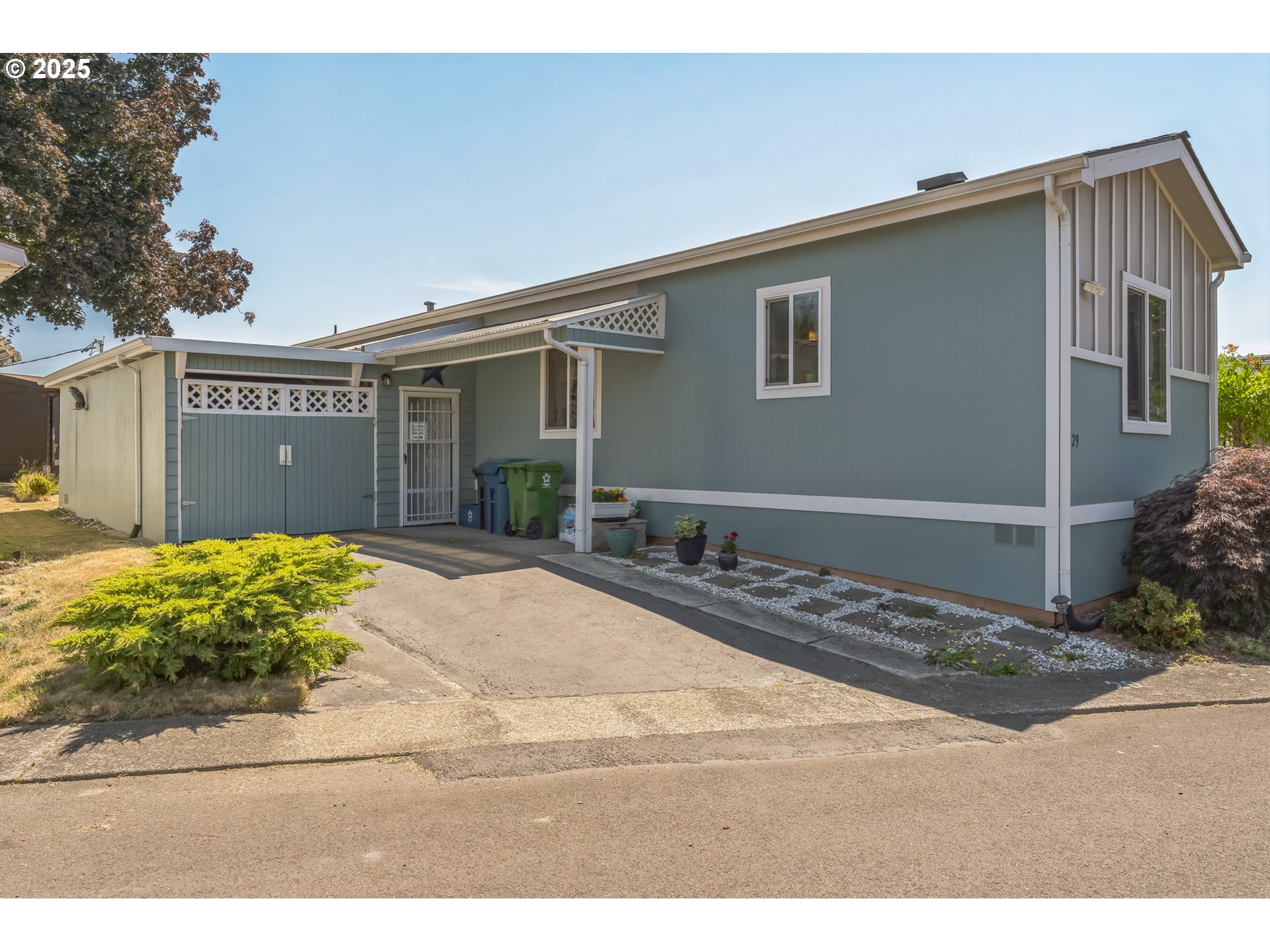 1999 Jansen Way, Unit 29 Woodburn, OR 97071 - Photo 3 of 33 a view of a house with a backyard