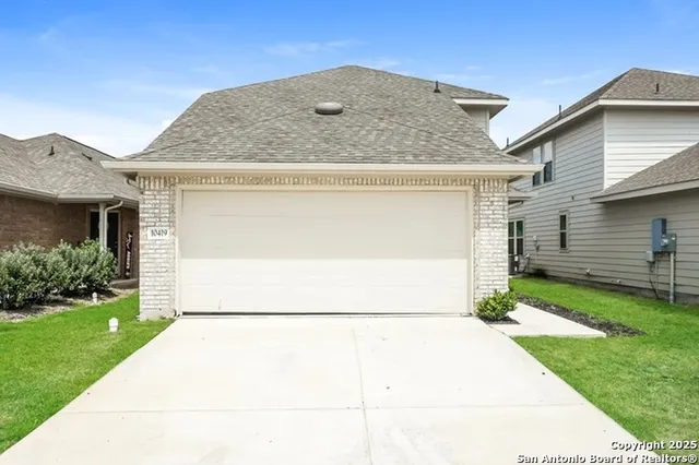 a house view with a backyard space