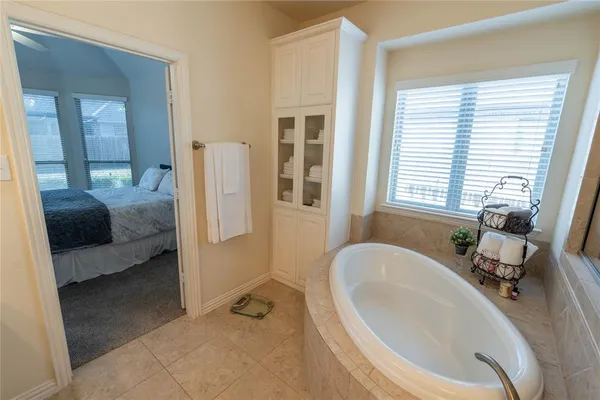 a kitchen with stainless steel appliances granite countertop a stove and a refrigerator