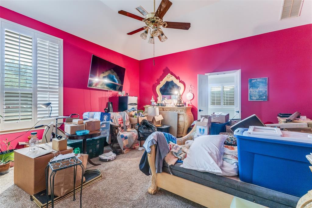 1036 Dunhill Lane Forney, TX 75126 - Photo 13 of 25 a living room with furniture and a mirror