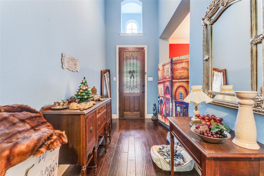 1036 Dunhill Lane Forney, TX 75126 - Photo 4 of 25 a table and chairs in a kitchen