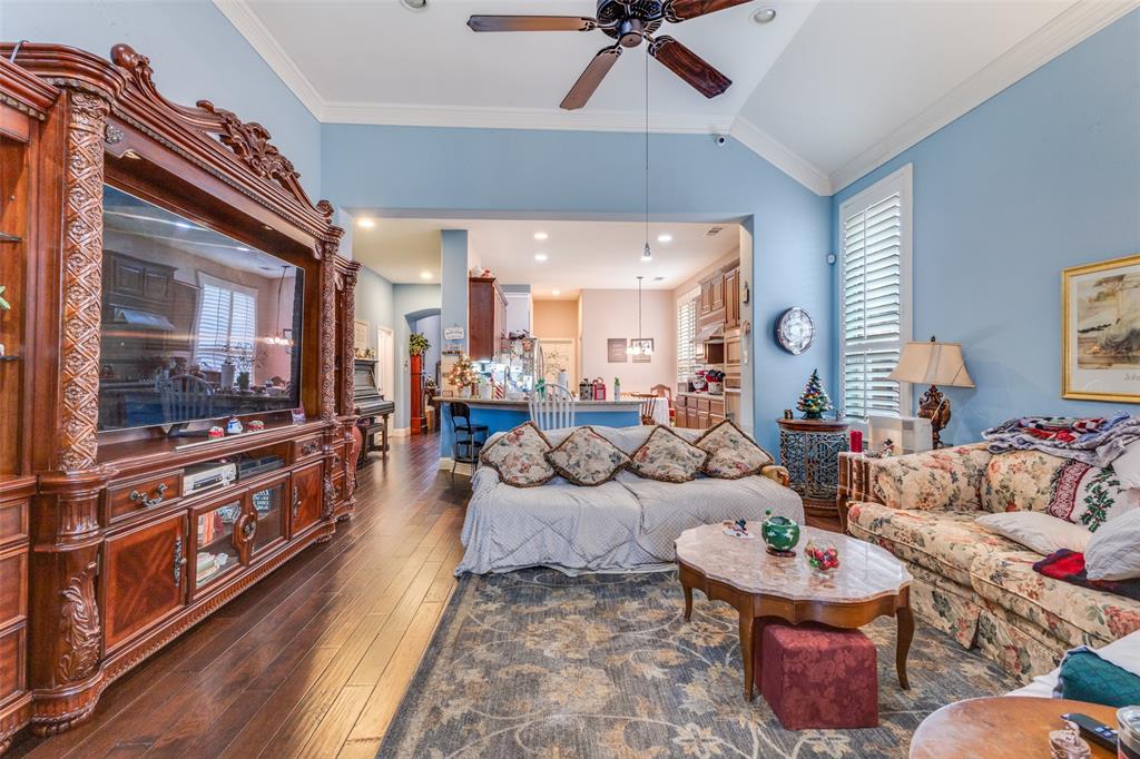 1036 Dunhill Lane Forney, TX 75126 - Photo 7 of 25 a living room with furniture and a flat screen tv