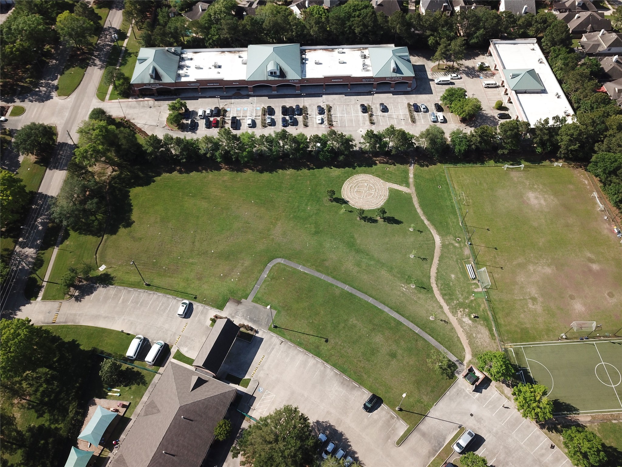0 South Mason Road Katy, TX 77450 - Photo 2 of 10 an aerial view of a house with outdoor space lake and trees all around