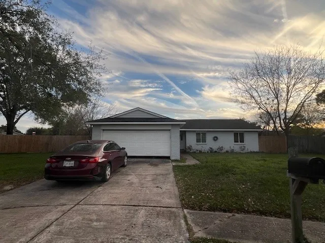 a car parked in front of a house