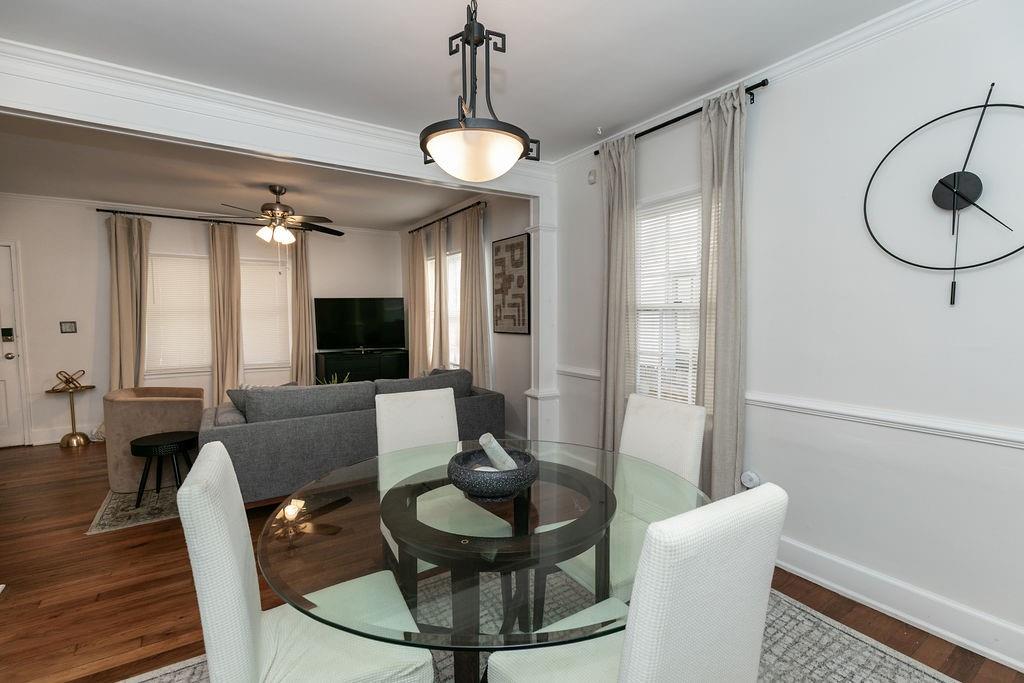 936 East Lake Drive Decatur, GA 30030 - Photo 13 of 50 a living room with furniture and a chandelier