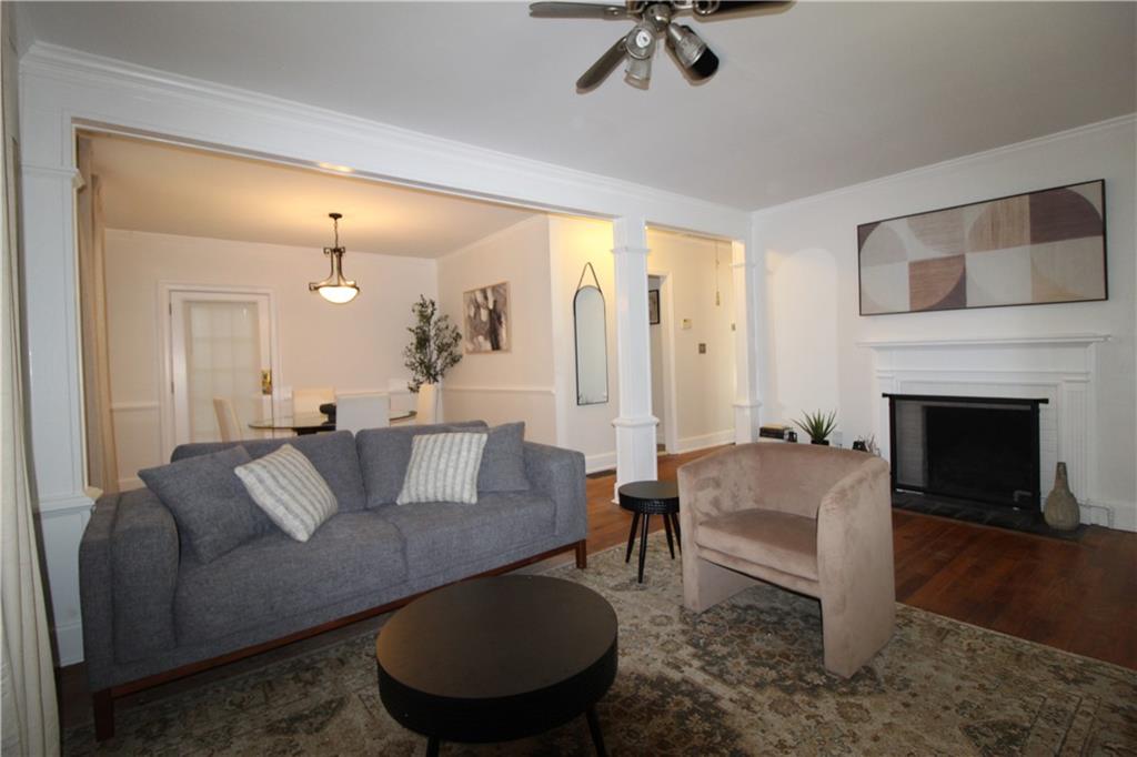 936 East Lake Drive Decatur, GA 30030 - Photo 40 of 50 a living room with furniture and a fireplace