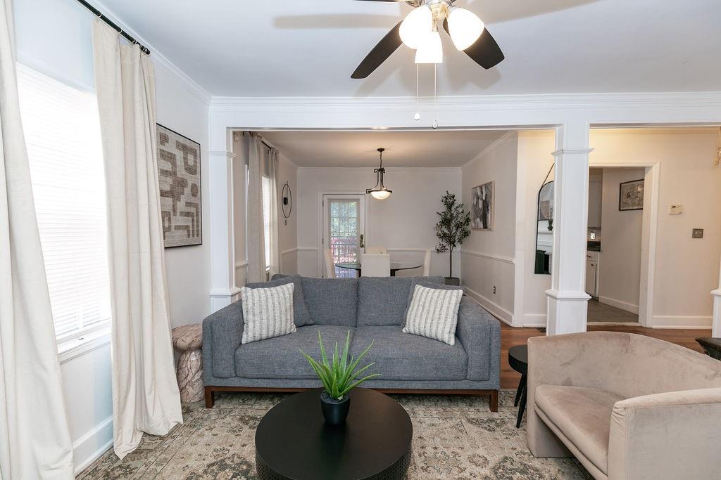 936 East Lake Drive Decatur, GA 30030 - Photo 8 of 50 a living room with furniture and a large window