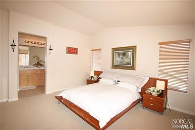 2684 Silver Stone Lane Santa Rosa, CA 95407 - Photo 9 of 12 Luxurious master bedroom suite features lofted ceilings and a roomy walk-in closet.