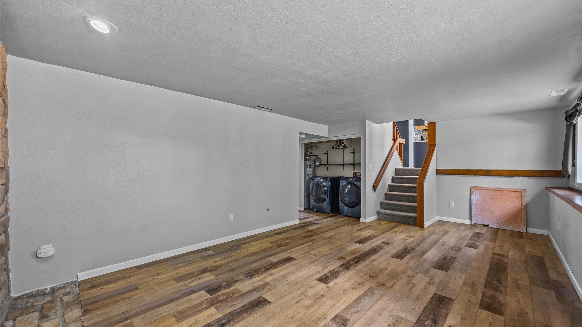 386 Ridge Cir Drive Grand Junction, CO 81507 - Photo 19 of 33 a view of a bedroom with furniture and stairs