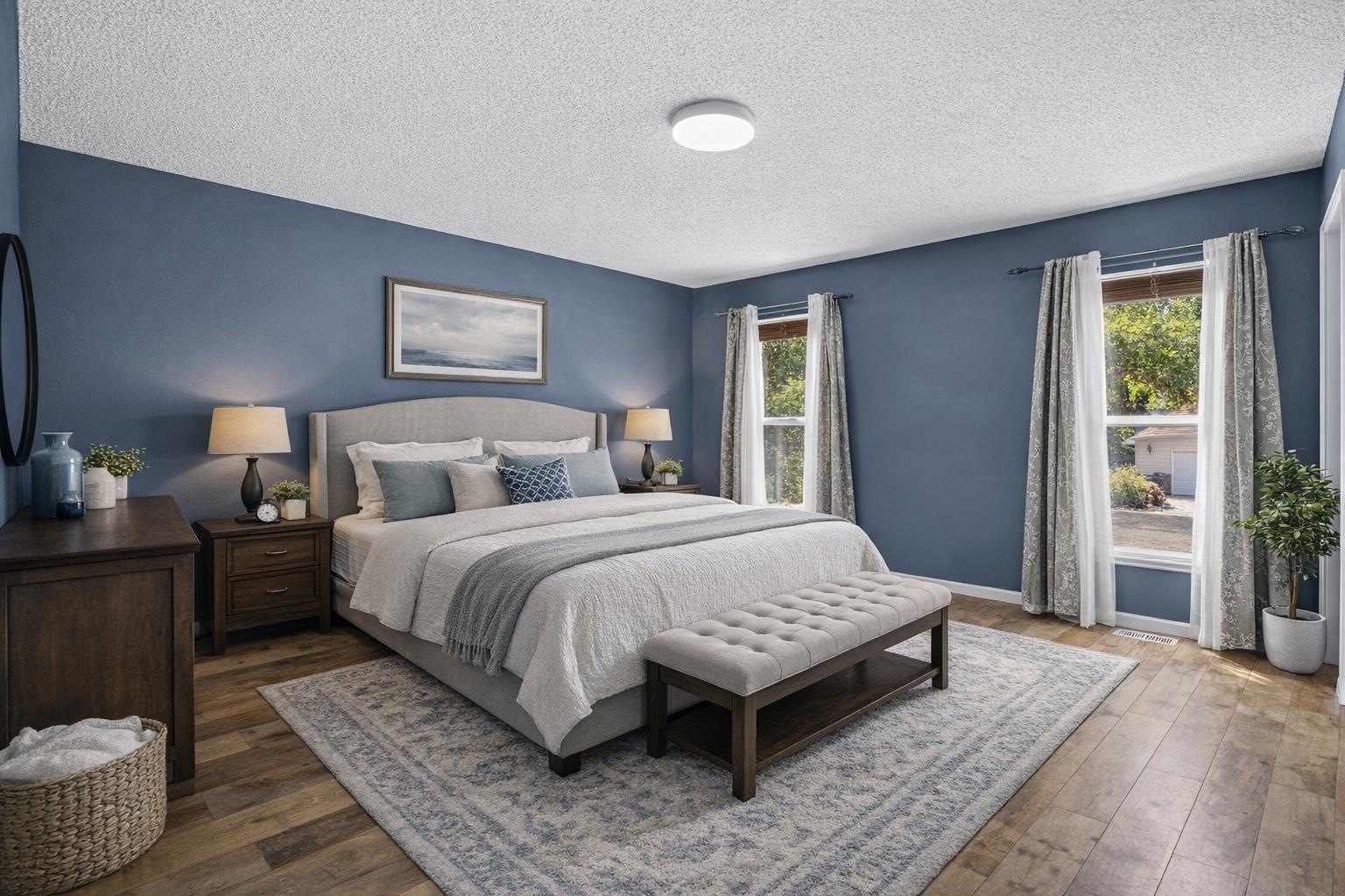 386 Ridge Cir Drive Grand Junction, CO 81507 - Photo 20 of 33 a bedroom with a bed wooden floor and window