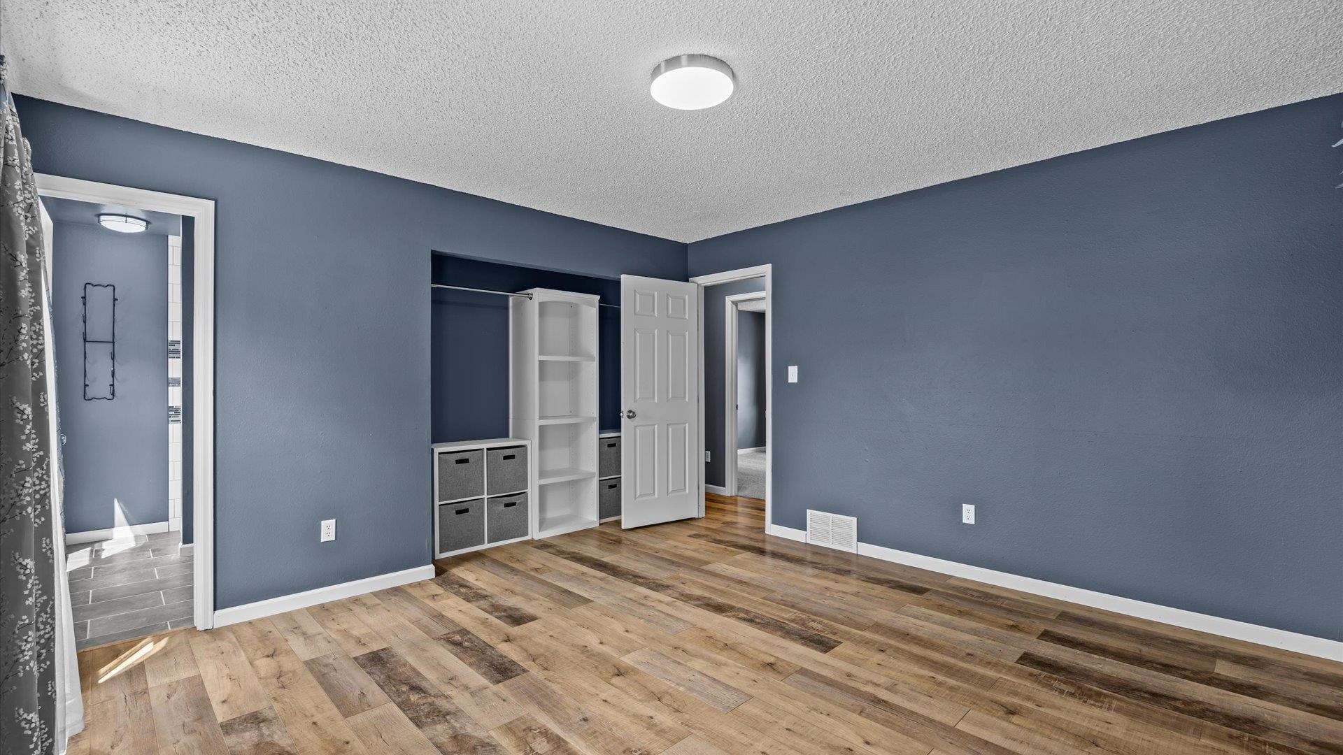 386 Ridge Cir Drive Grand Junction, CO 81507 - Photo 22 of 33 a bedroom with a bed and a dresser