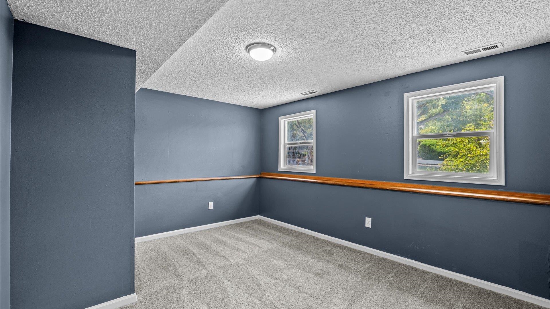 386 Ridge Cir Drive Grand Junction, CO 81507 - Photo 28 of 33 a view of an empty room with a window