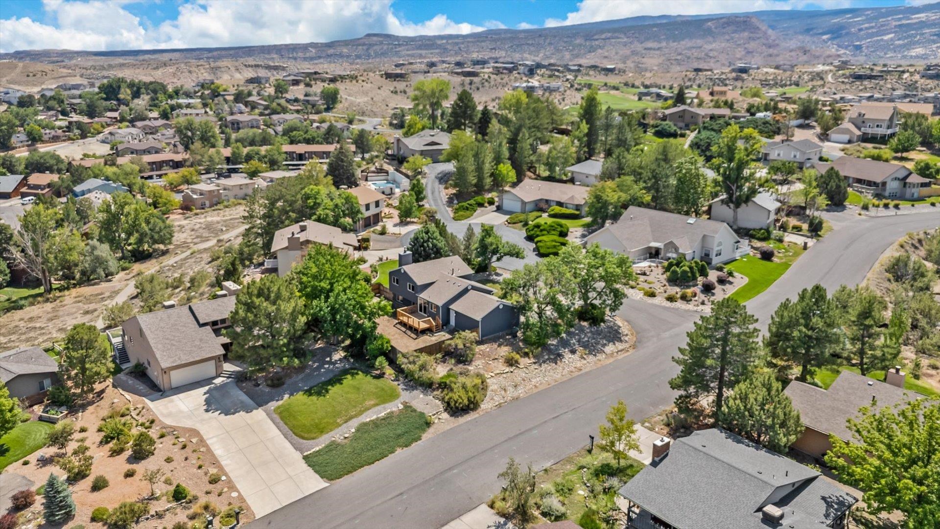 386 Ridge Cir Drive Grand Junction, CO 81507 - Photo 33 of 33 an aerial view of a house with a yard