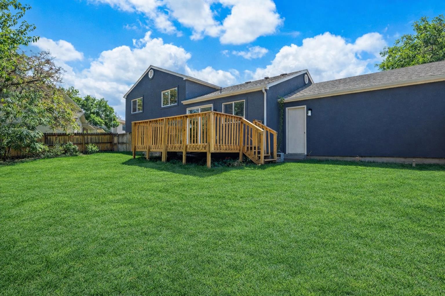 386 Ridge Cir Drive Grand Junction, CO 81507 - Photo 7 of 33 a view of a house with a backyard