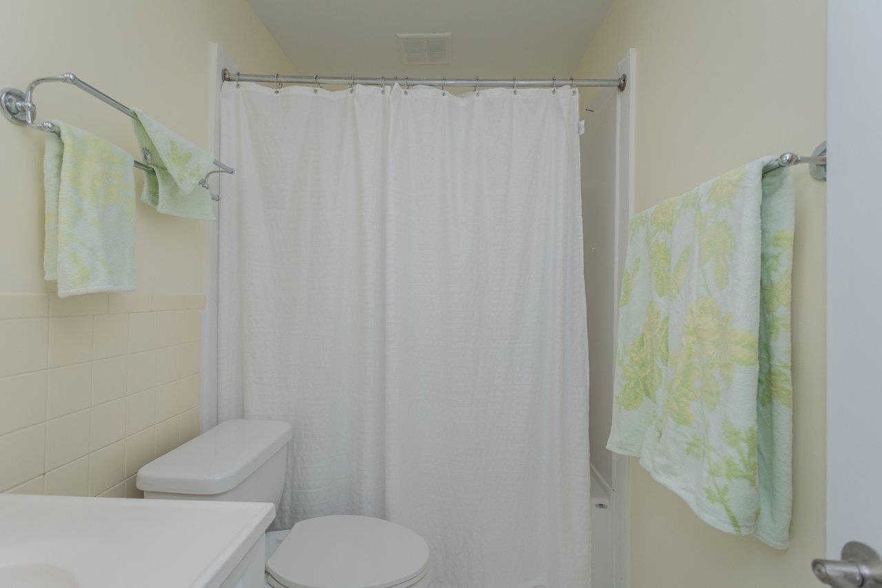 2527 Hydraulic Road, Unit 26 Charlottesville, VA 22901 - Photo 28 of 56 a white toilet sitting next to a shower