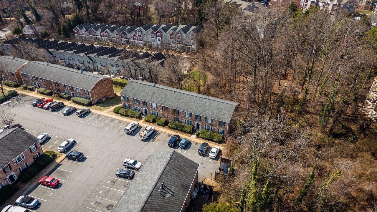 2527 Hydraulic Road, Unit 26 Charlottesville, VA 22901 - Photo 35 of 56 an aerial view of a house with a yard
