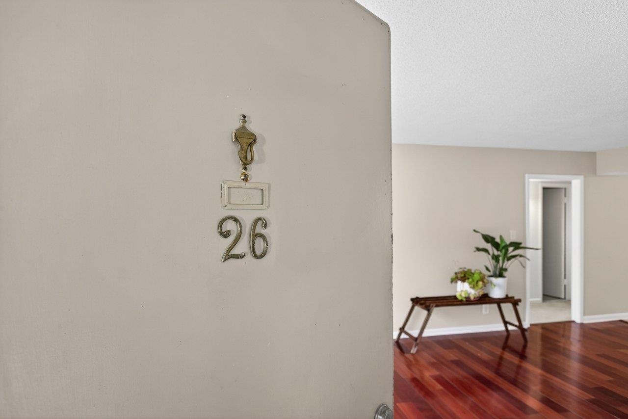 2527 Hydraulic Road, Unit 26 Charlottesville, VA 22901 - Photo 4 of 56 a view of a entryway with wooden floor