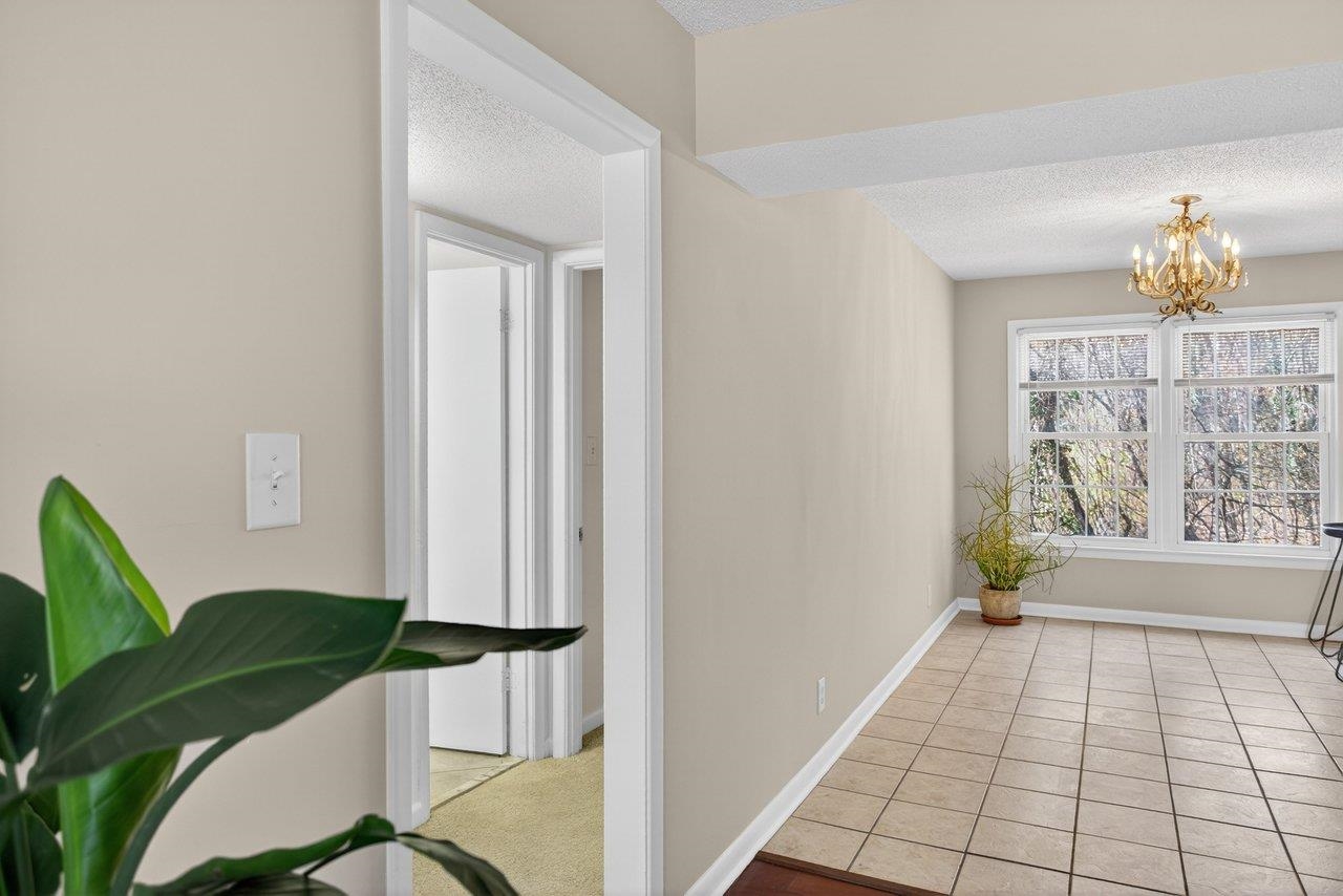 2527 Hydraulic Road, Unit 26 Charlottesville, VA 22901 - Photo 10 of 56 a view of a livingroom with furniture and a window