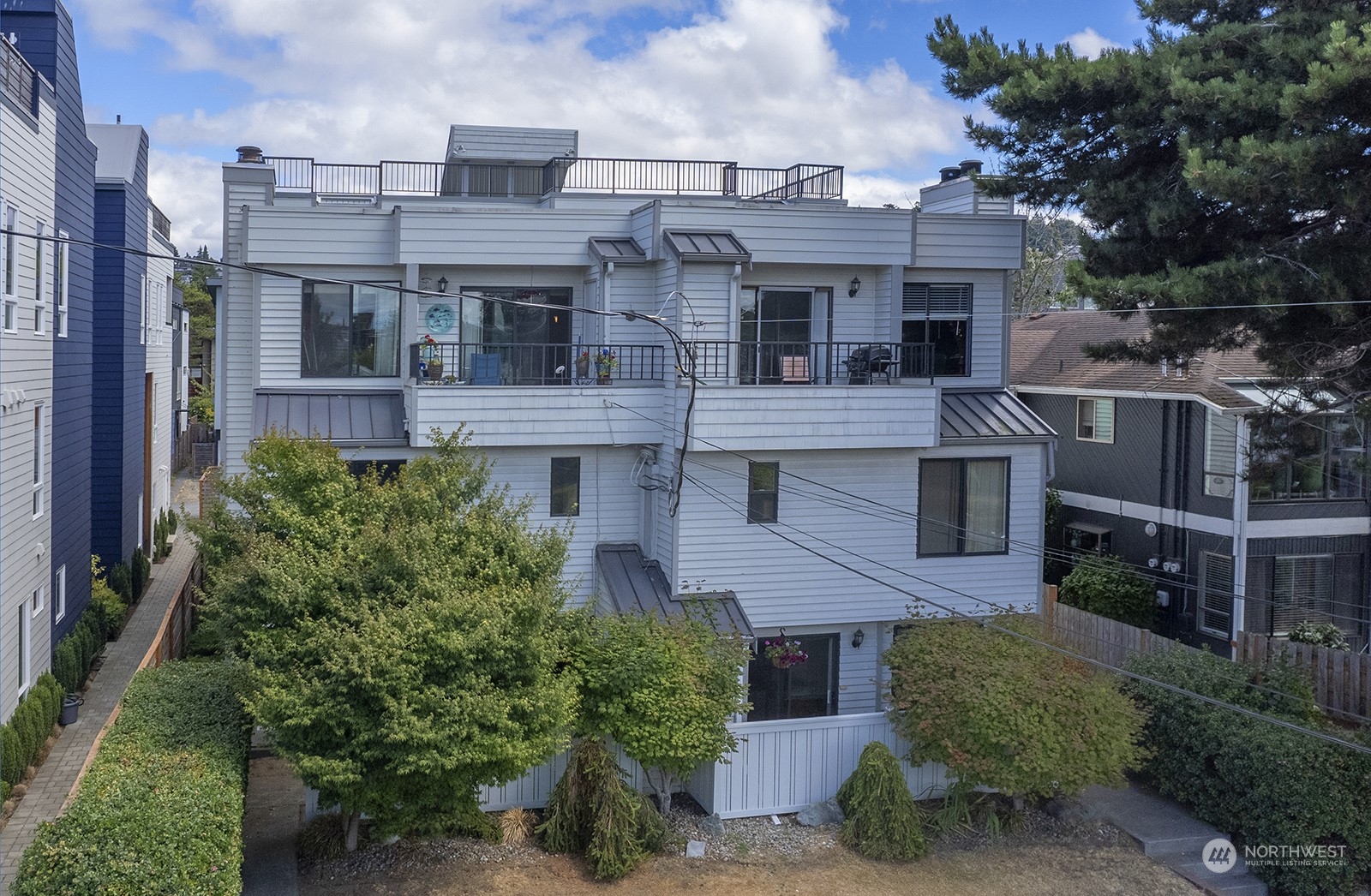 3030 63rd Avenue Southwest, Unit 2 Seattle, WA 98116 - Photo 3 of 32 an aerial view of a house