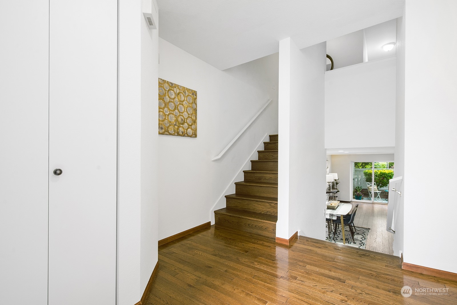 3030 63rd Avenue Southwest, Unit 2 Seattle, WA 98116 - Photo 5 of 32 a view of an entryway with wooden floor
