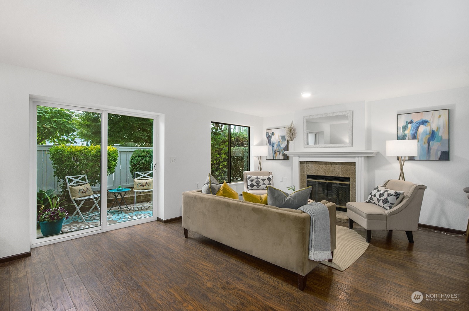 3030 63rd Avenue Southwest, Unit 2 Seattle, WA 98116 - Photo 6 of 32 a living room with furniture and a fireplace