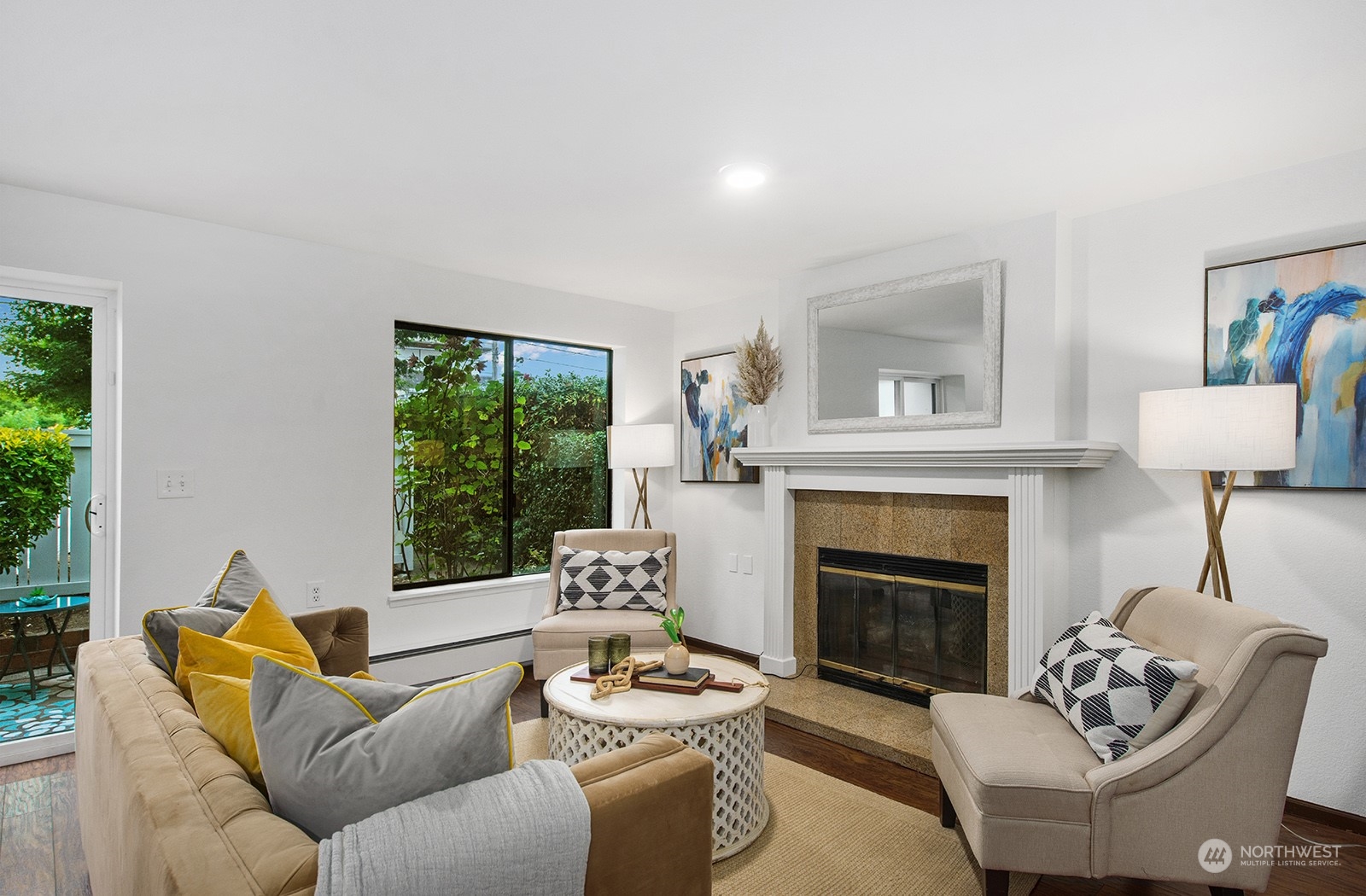 3030 63rd Avenue Southwest, Unit 2 Seattle, WA 98116 - Photo 7 of 32 a living room with furniture and a fireplace