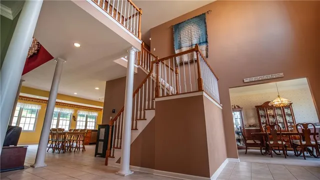 a view of dining room with furniture and chandelier