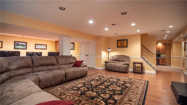 a dining room with a table and chairs