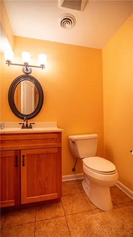 a workspace with furniture and mirror