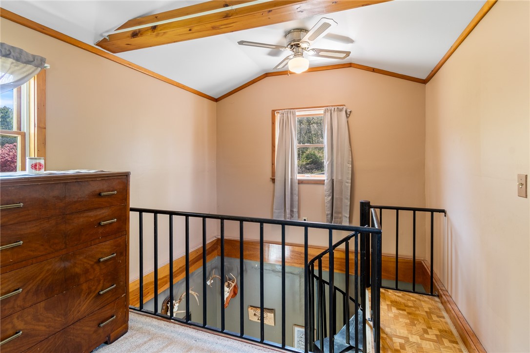 5443 Russell Road Marion, NY 14505 - Photo 22 of 48 The spiral staircase to the primary bedroom