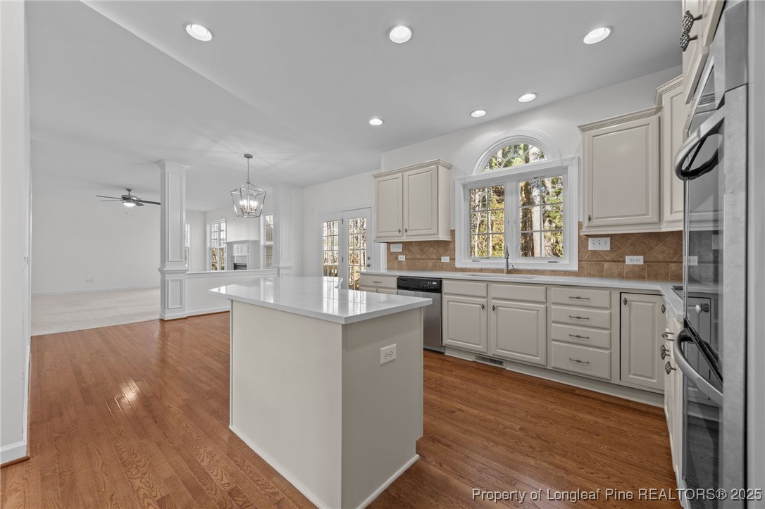 4518 Paces Ferry Drive Durham, NC 27712 - Photo 13 of 44 a kitchen with counter top space and appliances