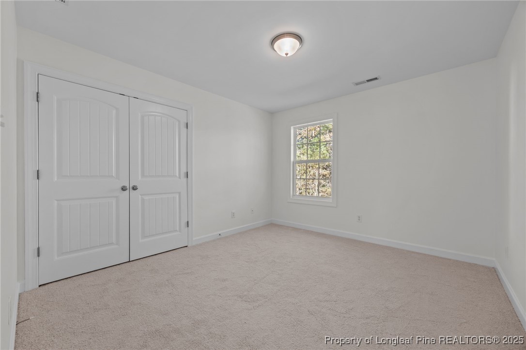 4518 Paces Ferry Drive Durham, NC 27712 - Photo 29 of 44 an empty room with windows