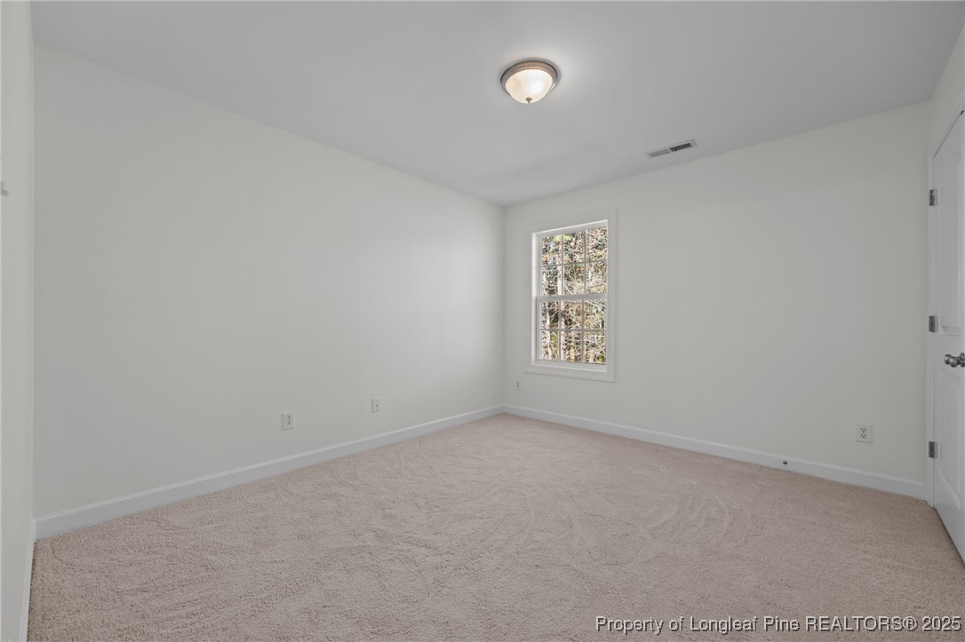 4518 Paces Ferry Drive Durham, NC 27712 - Photo 30 of 44 an empty room with a window