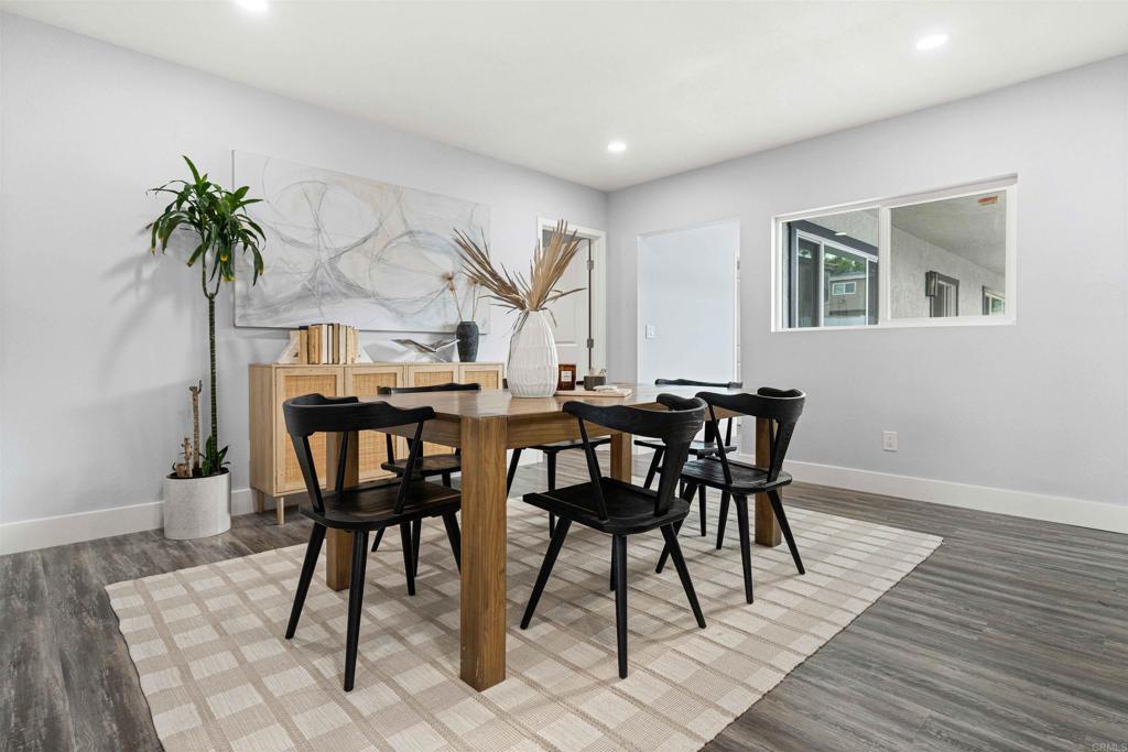 4542 Palm Avenue La Mesa, CA 91941 - Photo 17 of 55 a view of a dining room with furniture and wooden floor