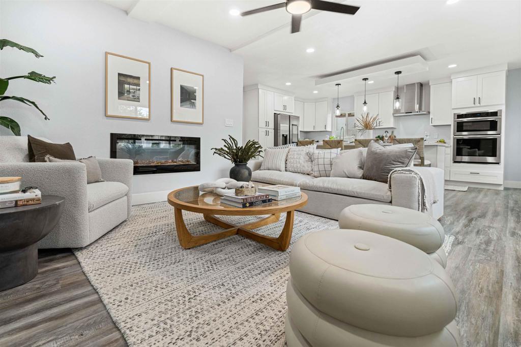 4542 Palm Avenue La Mesa, CA 91941 - Photo 2 of 55 a living room with furniture and a fireplace
