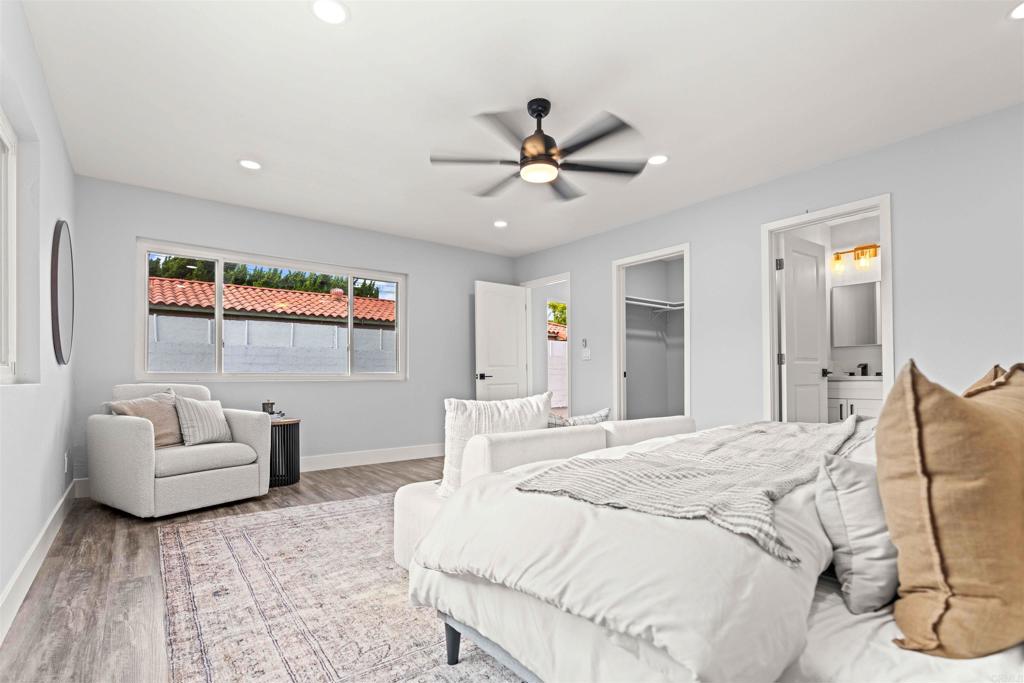 4542 Palm Avenue La Mesa, CA 91941 - Photo 26 of 55 a spacious bedroom with a bed and furniture
