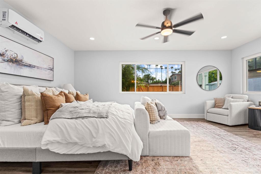4542 Palm Avenue La Mesa, CA 91941 - Photo 27 of 55 a bedroom with a bed and ceiling fan
