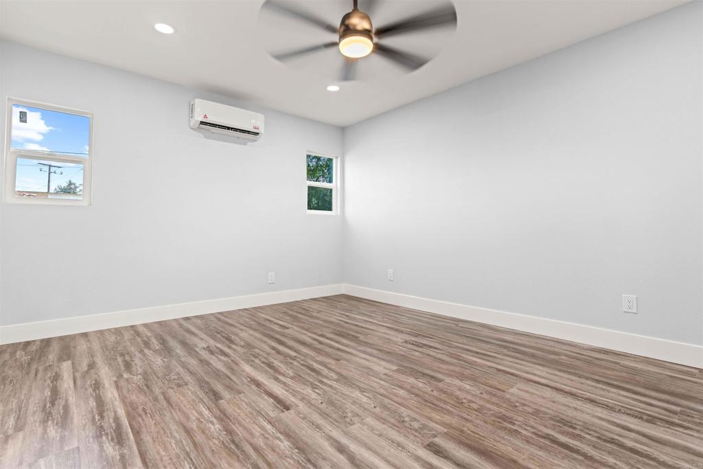 4542 Palm Avenue La Mesa, CA 91941 - Photo 32 of 55 wooden floor in an empty room with a window