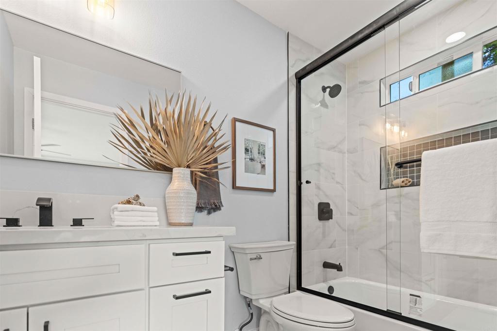 4542 Palm Avenue La Mesa, CA 91941 - Photo 35 of 55 a bathroom with a sink a toilet and shower