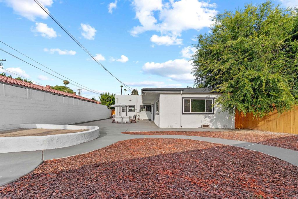 4542 Palm Avenue La Mesa, CA 91941 - Photo 45 of 55 a view of a porch with chairs and potted plants