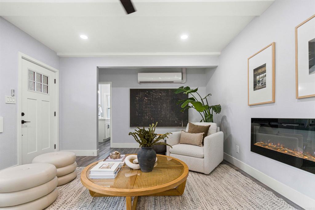 4542 Palm Avenue La Mesa, CA 91941 - Photo 8 of 55 a living room with furniture and a fireplace