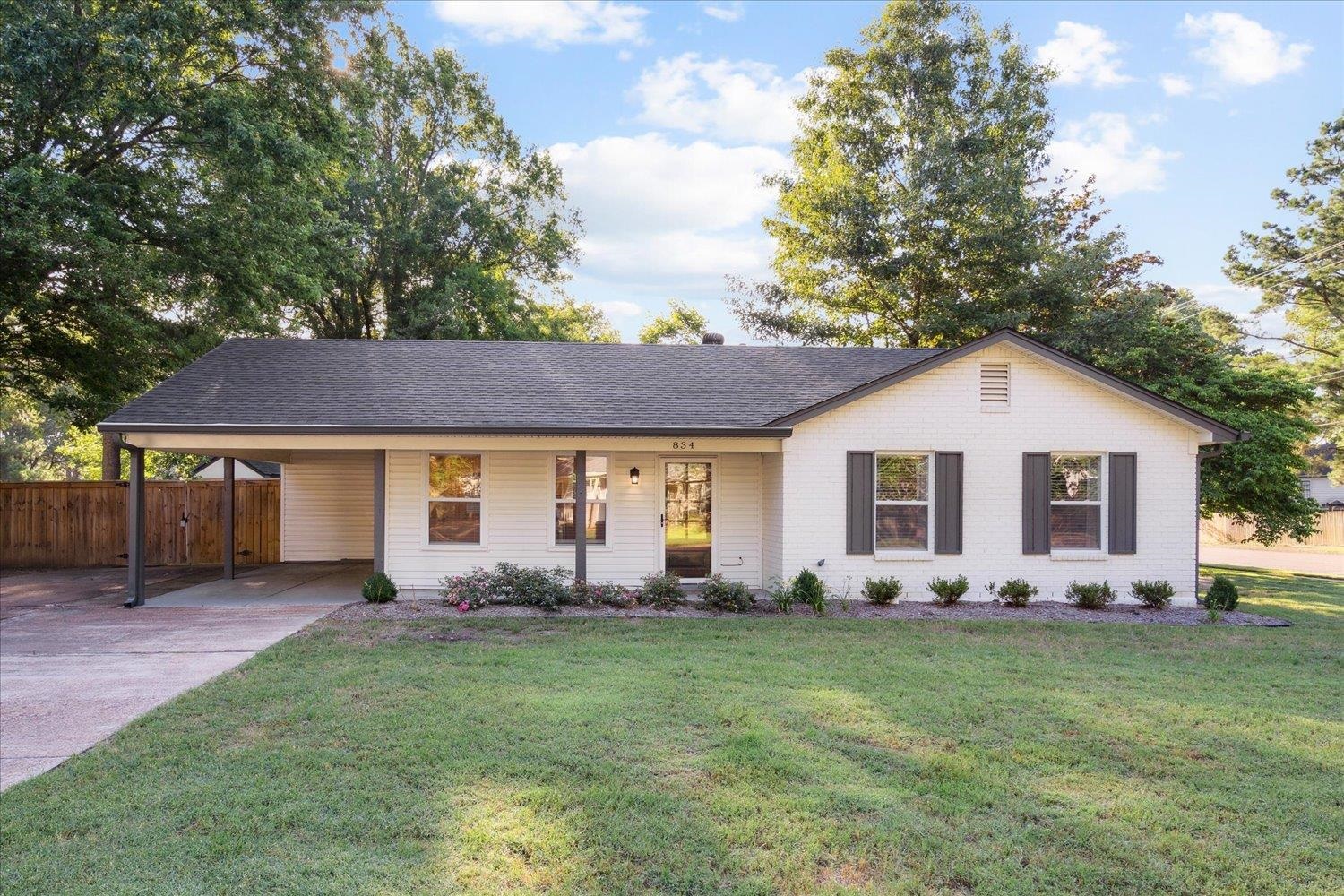 834 Greencliff Road Collierville, TN 38017 - Photo 1 of 20 a front view of house with yard and green space