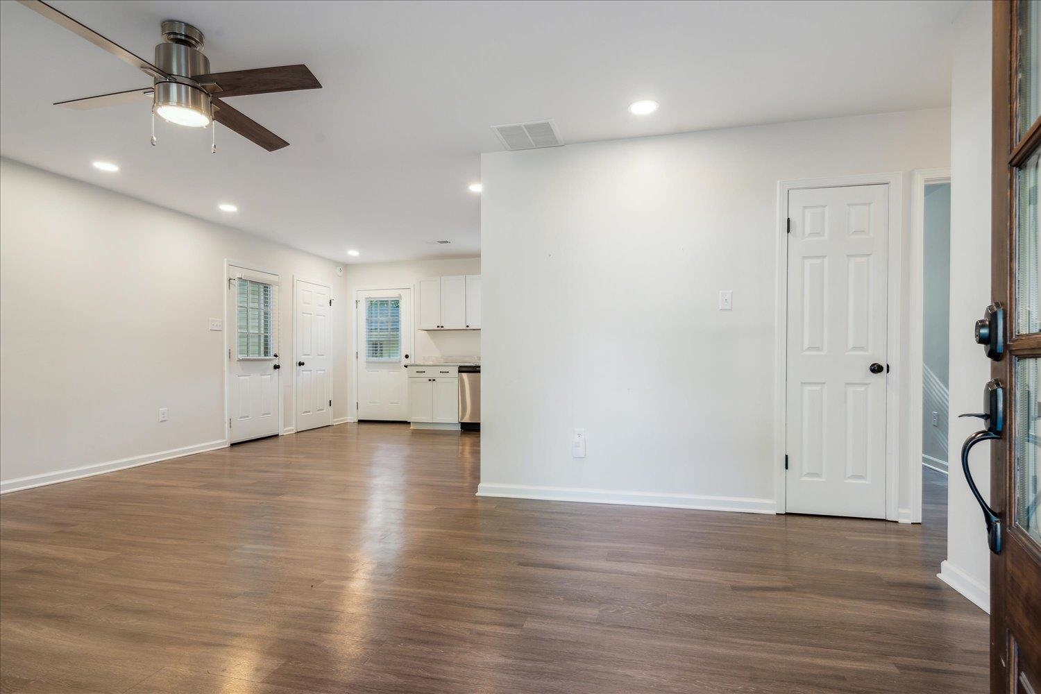 834 Greencliff Road Collierville, TN 38017 - Photo 3 of 20 wooden floor in an empty room with a ceiling fan