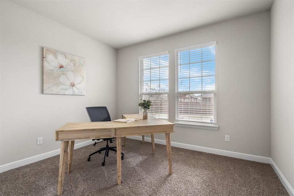 1864 Mensa Drive Haslet, TX 76052 - Photo 29 of 40 a view of a workspace with furniture and a window
