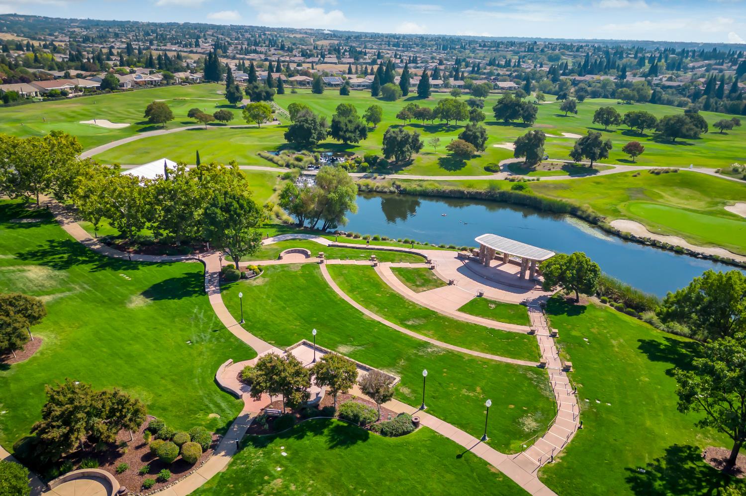 2272 Winding Way Lincoln, CA 95648 - Photo 38 of 46 an aerial view of a house with a garden and lake view