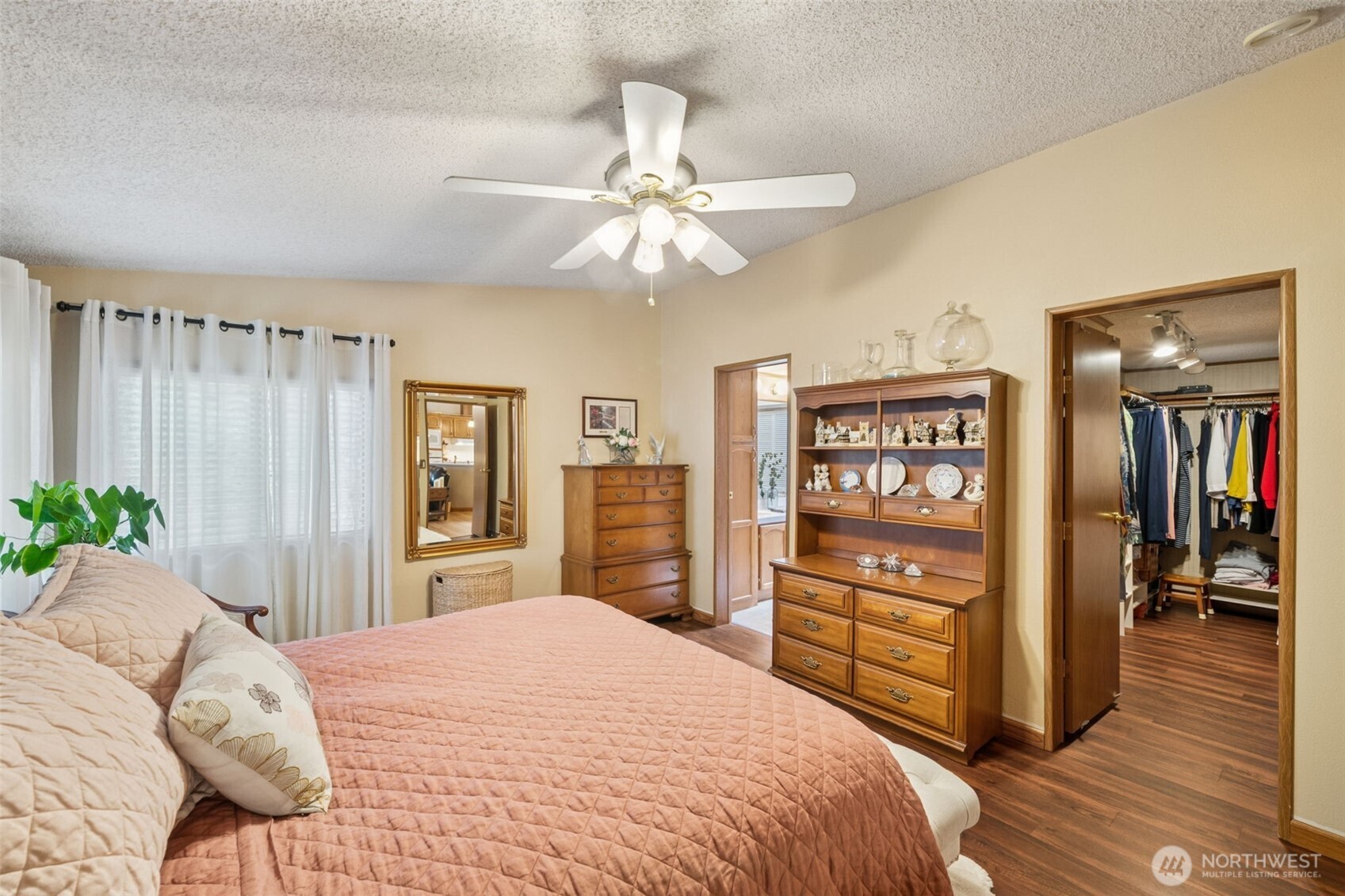 2350 Rincon Avenue Enumclaw, WA 98022 - Photo 17 of 31 a bedroom with a bed and a dresser