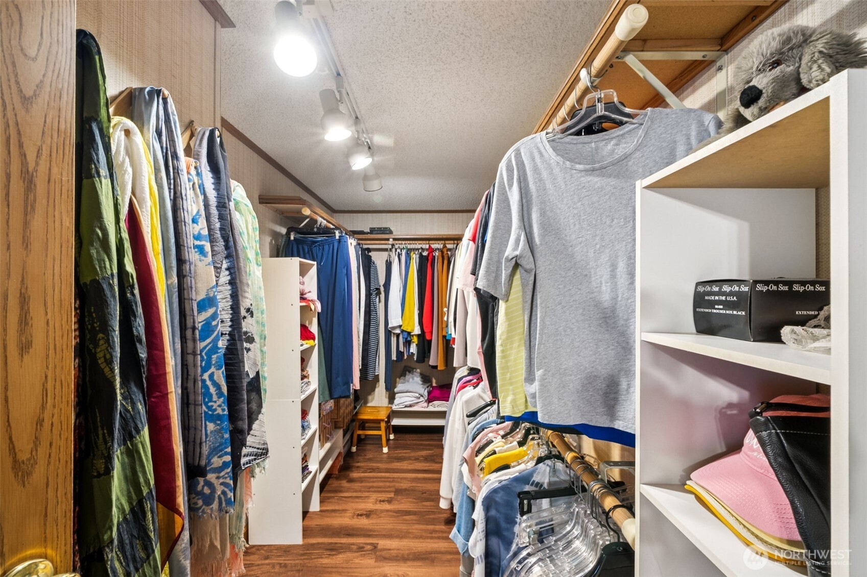 2350 Rincon Avenue Enumclaw, WA 98022 - Photo 19 of 31 a view of walk in closet with clothes and shoes