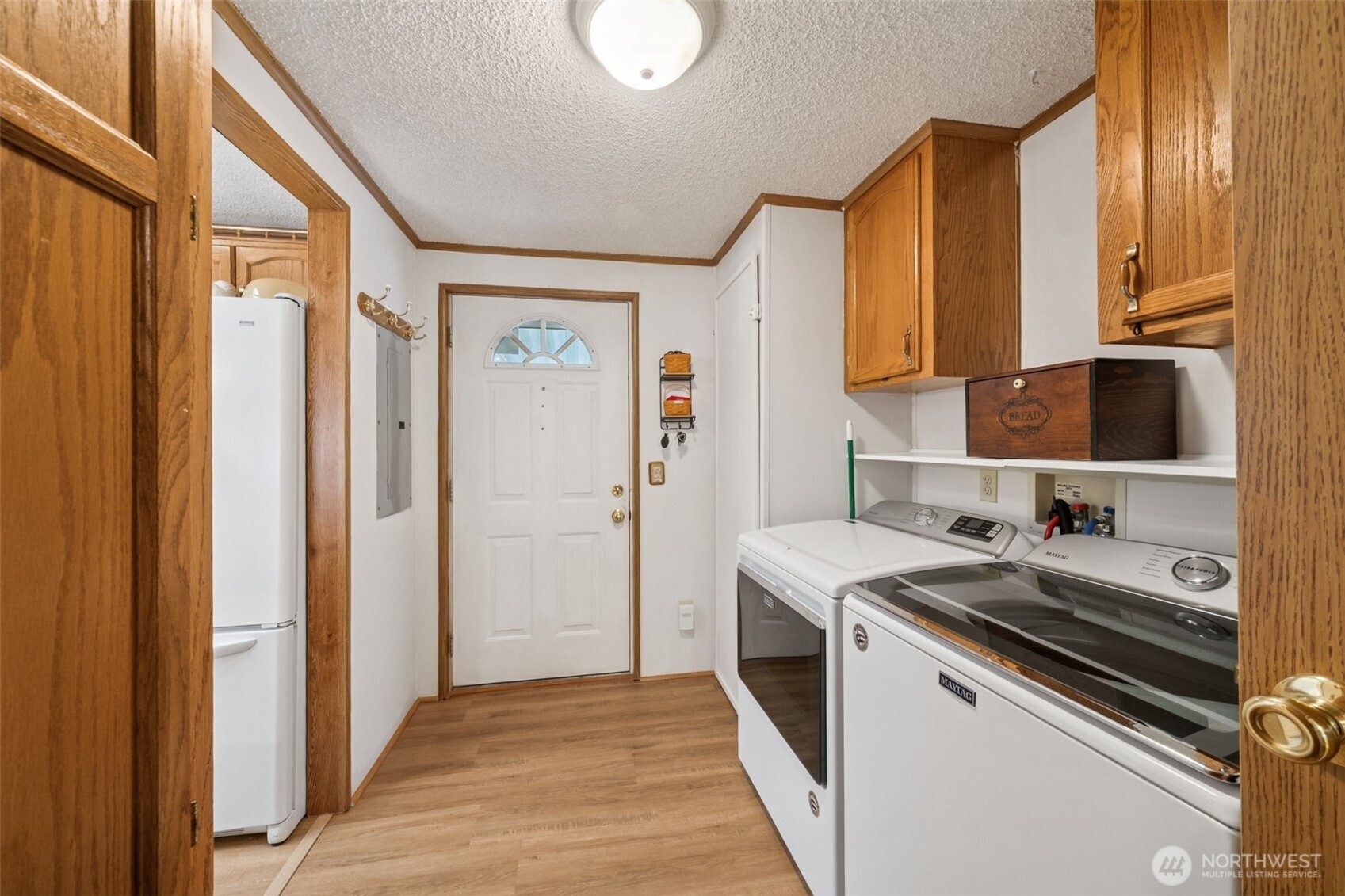 2350 Rincon Avenue Enumclaw, WA 98022 - Photo 25 of 31 a kitchen with a sink cabinets and appliances
